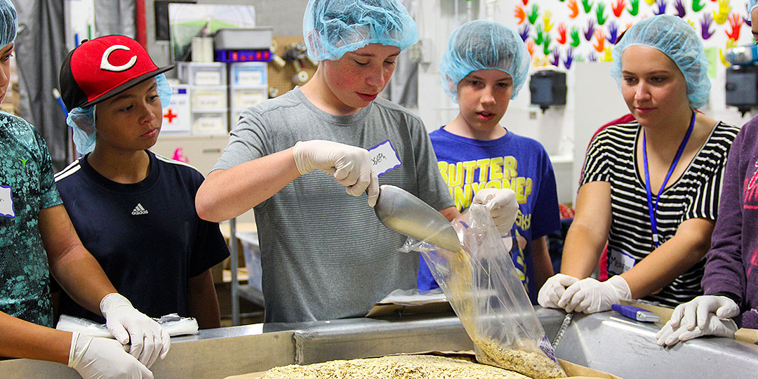 Kids packing lunches